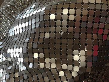 A part of aluminum metal fabric which is made of metal flakes.