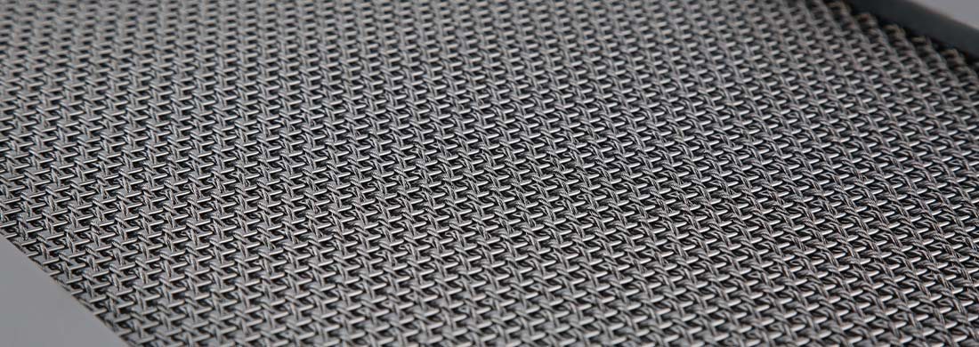 A piece of stainless steel architectural cable mesh.