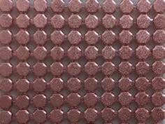 A piece of light purple color metallic fabric.