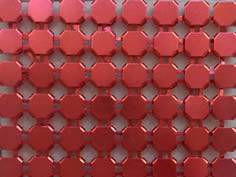 A piece of red metallic fabric.