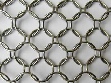 Single layer architectural ring mesh is connected ring by ring.
